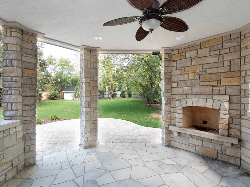 Stone covered patio in new construction home